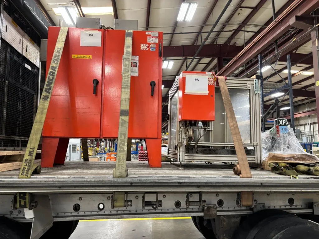 Flatbed truck carrying industrial equipment